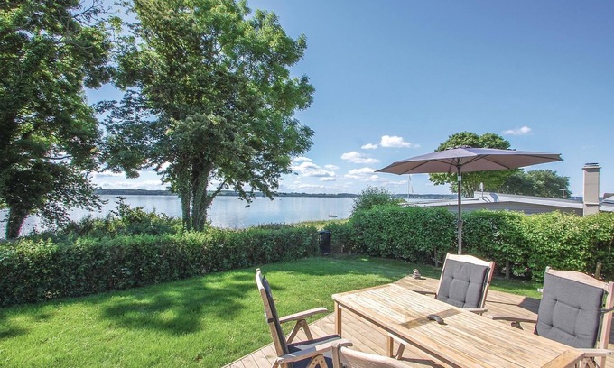 Aabenraa House | In a unique location, only 30 m from the water, this modern and inviting vacation home awaits you.