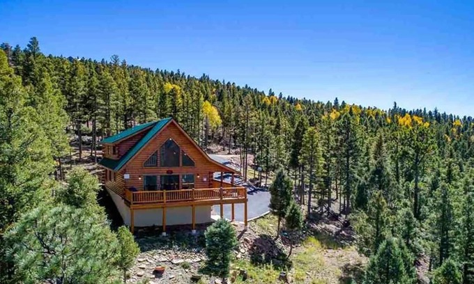Angel Fire House | Incredible Views! Stunning log home w/wrap around deck and covered porch