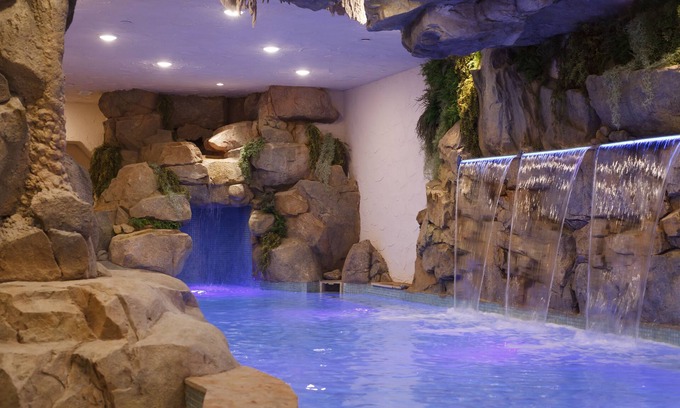 Gatlinburg - Pigeon Forge Cabin | Indigo Falls ~ 8BR w/Golf Simulator, Indoor Cave Pool, Hot Tub, Game Room, Theater, & Views!