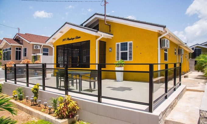 Falmouth House | Indulge in a breathtaking getaway as you escape to a magnificent vacation home.