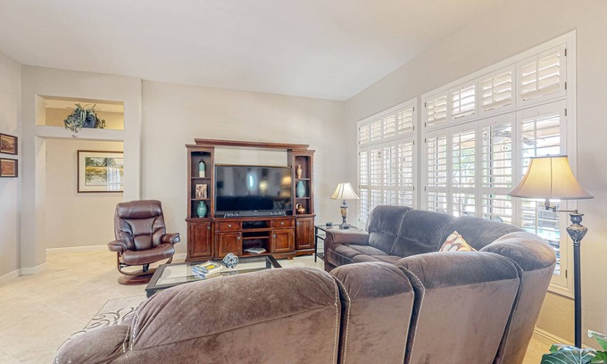 Sun City West House | Inviting home with full kitchen, patio, central AC, & W/D