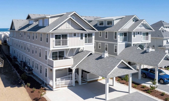Kill Devil Hills House | Island Enchantment - Oceanfront Pet Friendly Home w/Cabana Service! FlexStay! Incredible Views, Poolside Tiki Bar, Hot Tub, and More!