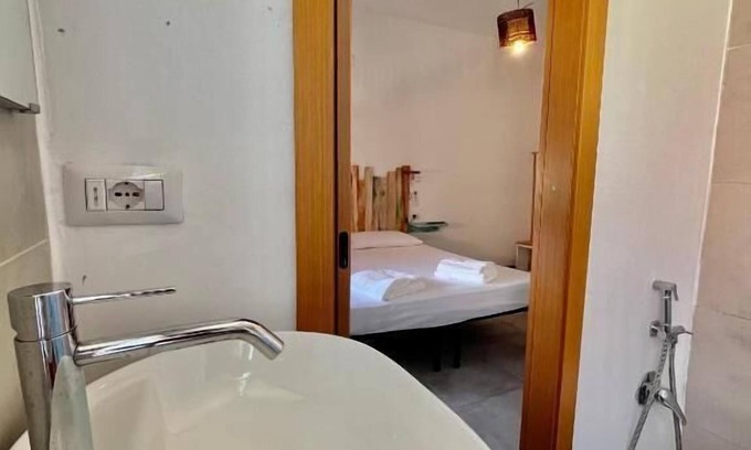 Porto Torres Apartment | Juniper Room - Full Service Room with Private Bathroom