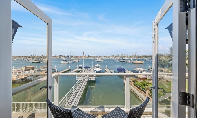 Balboa Peninsula House | Just Renovated Bay Facing Coastal Home with a Dock