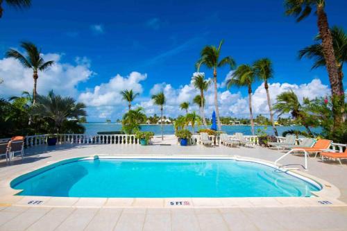 Rum Point Villa | Kailypso - Waterfront Villa with Pool, Renovated Interiors, and Dock on Bio Bay