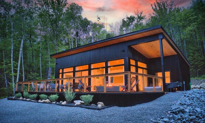 Lac-Superieur Ski Chalet | KALLM-Mont-Tremblant chalet with hot tub, pond & beach on private 7acre estate