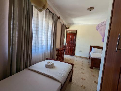 Fort Portal Hotel | Kasenene Legacy Hotel