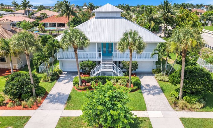 Marco Island House | KEY WEST STYLE 4-3 house, heated pool, deck, canal, outdoor kitchen & more