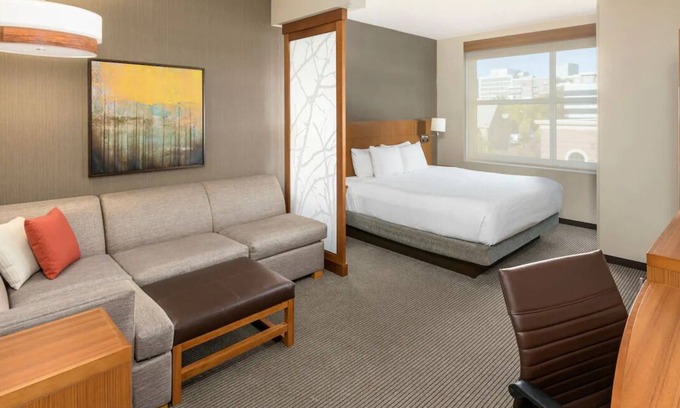 Greenville Downtown Apartment | King Comfort x2: Free WiFi, Indoor Pool, Steps from Bon Secours Arena