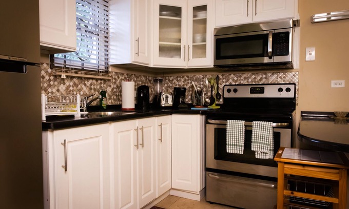 Port of Spain House | Kiskadee Korner