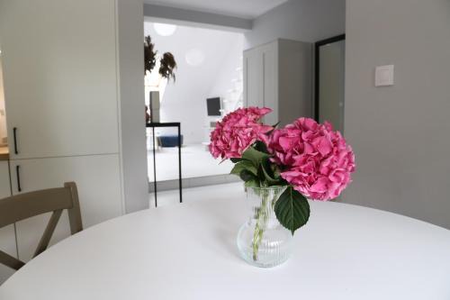 Barczewo Apartment | Komfortowe mieszkanie z antresolą i tarasem