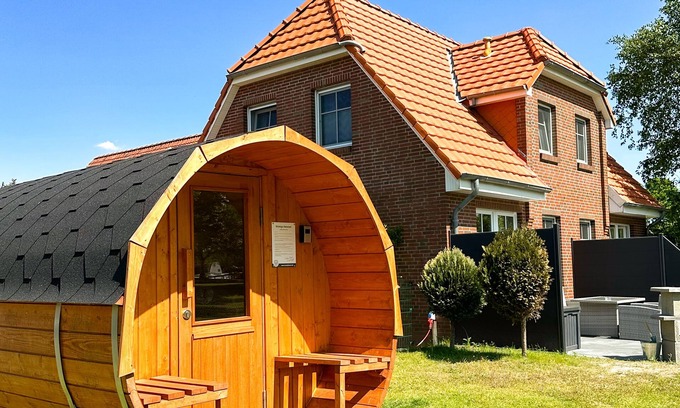Tannenhausen House | Lüttje Huck - Ferienwohnung 3 mit Seeblick & Sauna