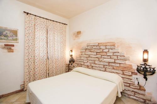 Agrustos House | La casa dell'olivastro