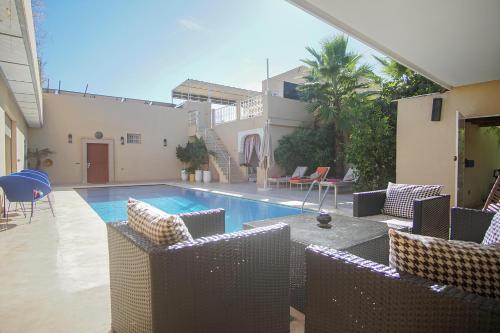 Tassoultante House | La ferme Marrakchi