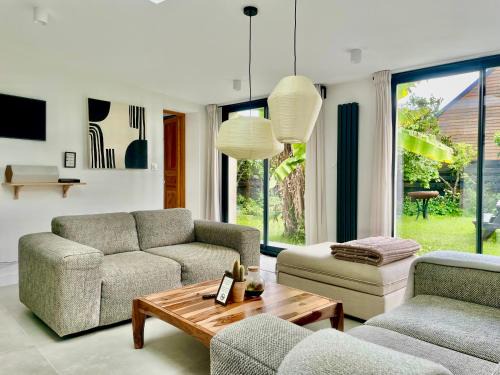 Saint-Come-de-Fresne House | La Maison Rose - Côté Terre by Melrose