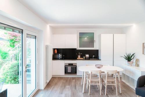 Montagnola Apartment | La Palma 3 by Quokka 360 - studio with terrace and lake view