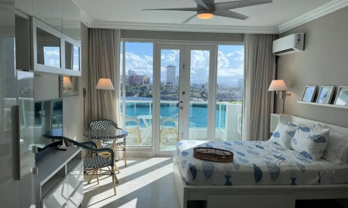 Puerta de Tierra Apartment | Lagoon View Studio | Balcony, Pool & Hot Tub