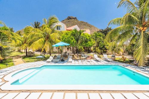 Tamarin Apartment | LAKAZ DEL SOL - Modern and elegant apartments with luxurious garden, pool and barbecue area - Tourism Permit Certified