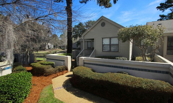 Sea Pines Apartment | Lake Forest, 3315 nicely furnished end unit with beautiful lagoon views