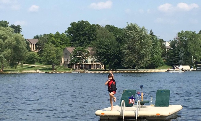 Brighton Cottage | Lake Front Cottage on Woodland Lake with private beach, boat and jet ski docks.