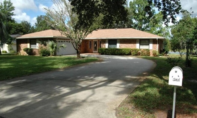 Inverness House | Lake Front Dock Home - Relax, Walk & Bike Path, Fish, Boat, Wine & Golf Nearby