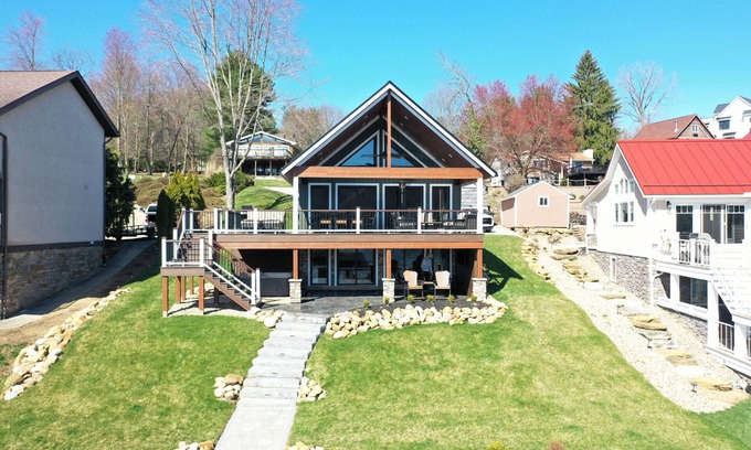 Howard House | Lake Front Paradise-Dock, Deck, Hot Tub, Lake & Sunrises-