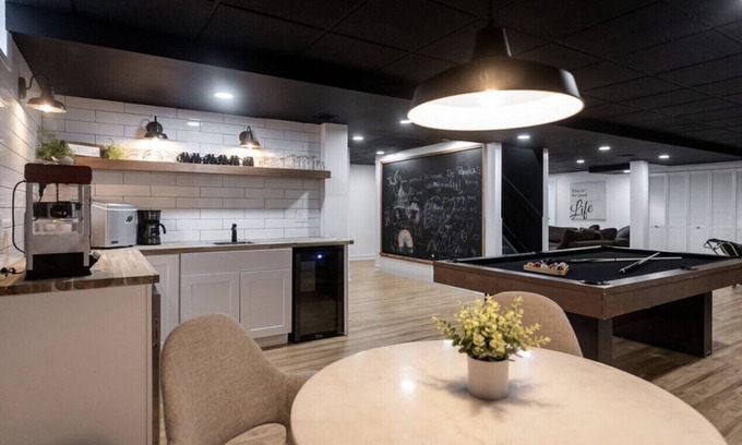 Athens House | Lake house with a game room