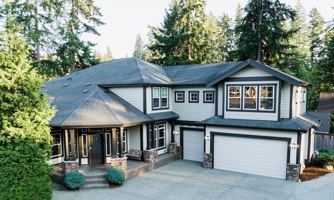 Lakeland South House | Lake Killarney Waterfront Craftsman Style House.