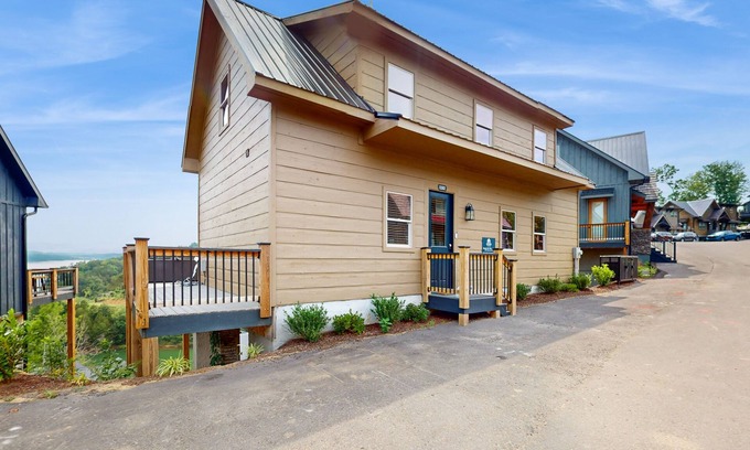 Sevierville Cabin | Lake view home w/hot tub, rocking chairs, fireplace, & free attraction tickets