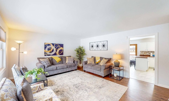 Portage House | Lake-view home with private hot tub, deck