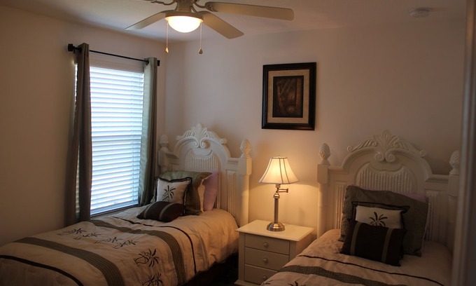 Loughman House | Lake view, hot tub, free Wi-Fi, 6 TVs, game room, gated community, club house
