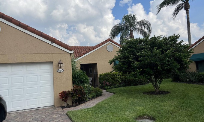 Pelican Bay House | Lakefront 3 bedroom, 2 bath home in gated community. Walking distance to beach.