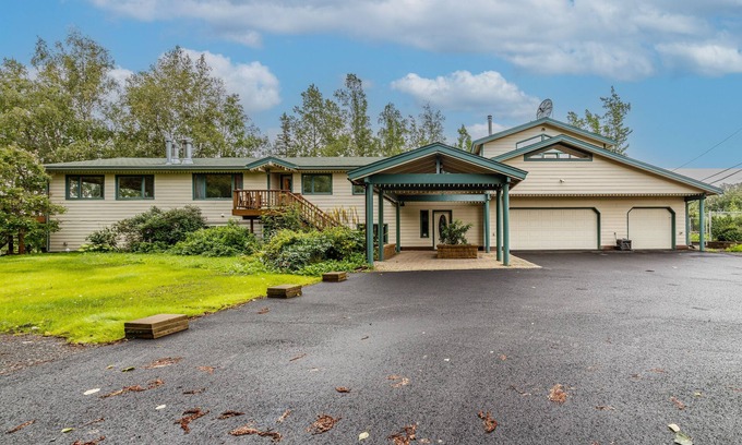 Sand Lake House | Lakefront Anchorage home with fireplaces, jetted tub & private dock