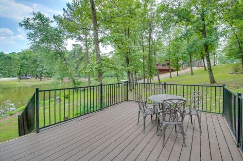 Mid America House | Lakefront Arkansas Home with Dock and Sunroom