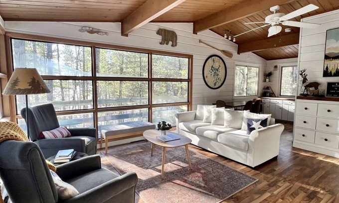 Three Lakes Cottage | Lakefront Cabin on Virgin Lake w/kayaks, lily pad, firepit, sandy swimming area