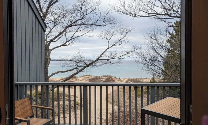 Maple City Condo | Lakefront condo on Lake Michigan. Fireplace. Beautiful resort setting.