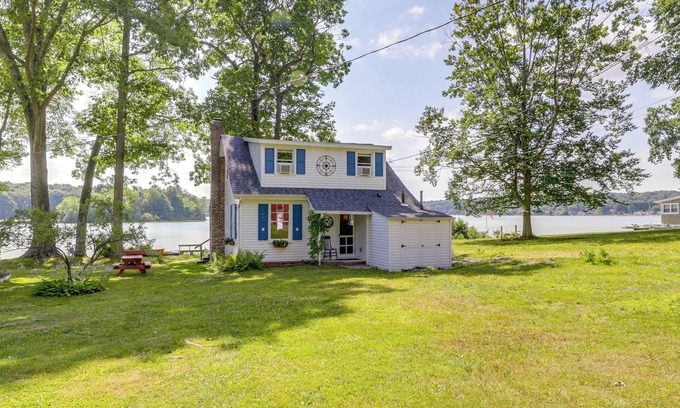 Coventry Lake Cottage | Lakefront Cottage w/Covered Porch & Dock!