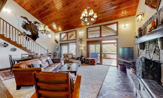 Rock Harbor Cabin | Lakefront home with amazing views, grill, fire pit, private dock, & AC