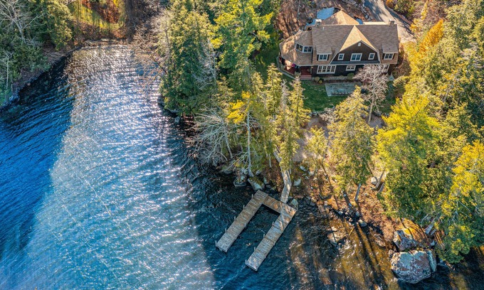 Meredith House | Lakefront home with a washer/dryer, deck, dock, & grill