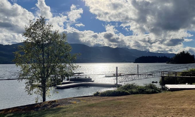 Youbou House | Lakefront home with tennis court & private dock & big back deck & sandy beach