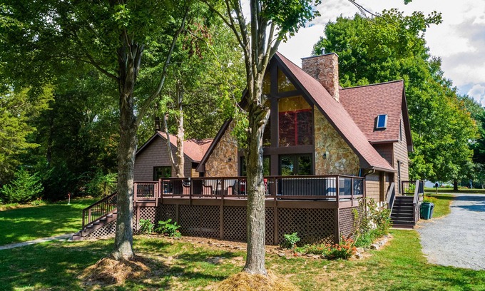 Bumpass House | Lakefront Retreat with Dock, Private Hot Tub, Central AC, and Private Beach