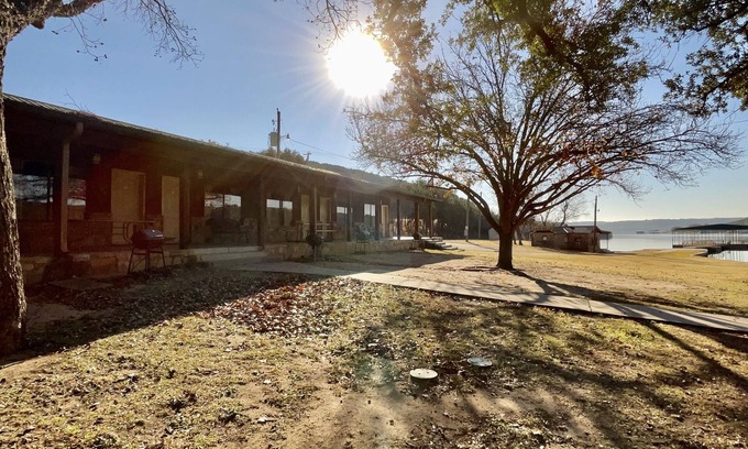 Graham Hotel | Lakefront views and covered porches among the trees.
