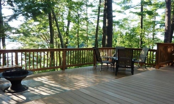 Hazelhurst Cottage | Lakeside Cottage in the Pines with Huge Deck, 40-foot Dock, and Sunset Views