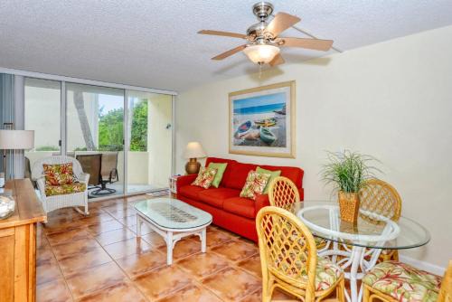 Longboat Key Apartment | LaPlaya 104E Perfectly located near the path to the beach just steps from the pool