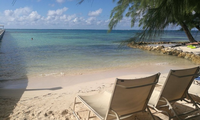 Bodden Town Condo | Large 2 bedroom & 2 bathroom condo with sea view terrace, 1 min walk to beach
