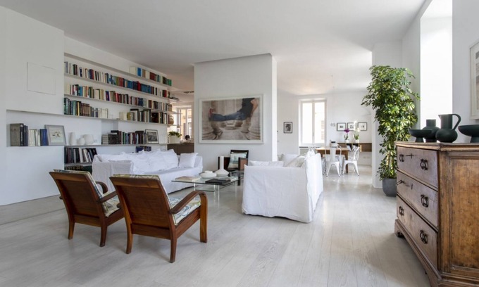 Esquilino Apartment | Large and bright 200sqm apartment, able to accommodate up to 7 people, located on the 3rd floor with elevator (not suitable for disabled people) of a building dating back to the 19th century. The property overlooks Piazza Fanti's garden and is located in