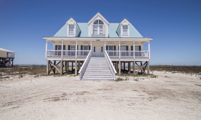 Dauphin Island House | Large Bayfront Home on sandy Bay beach with large screened porch.