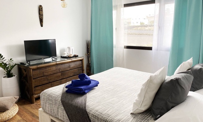 Tinajo Bed & Breakfast | Large double bedroom with bathroom