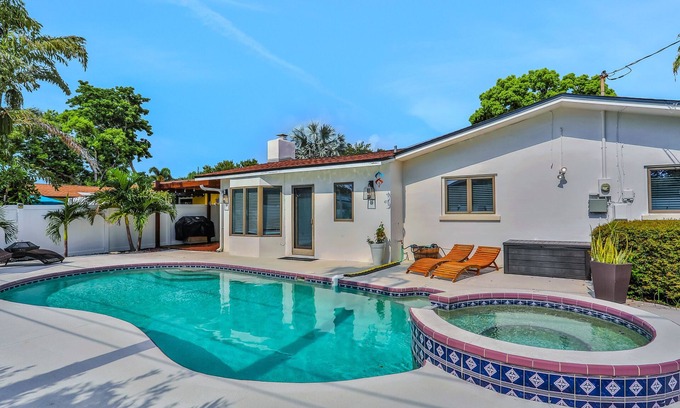 Seminole House | Large heated pool home with backyard oasis, dog friendly, AC and Wifi