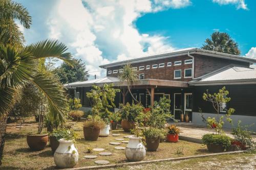 Le Lamentin House | Le Baobab Rouge - Maison d'hôtes réservée aux femmes